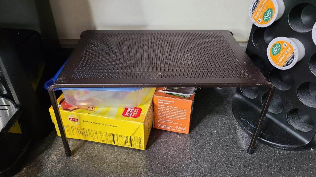 A stackable shelf on a kitchen countertop