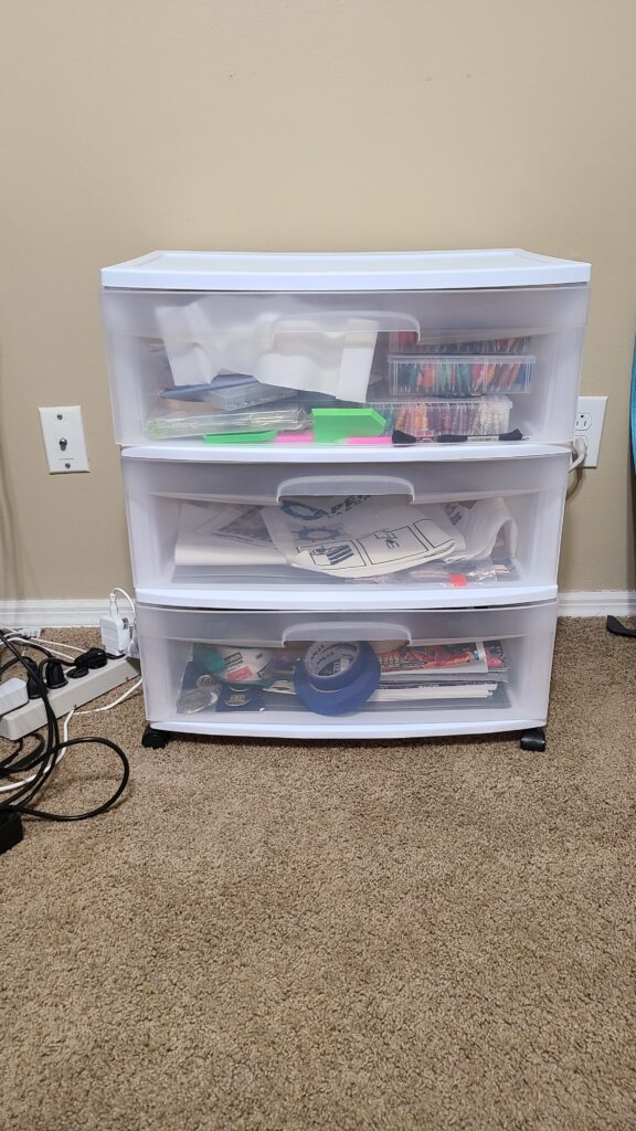 A large Sterilite cabinet with three drawers.