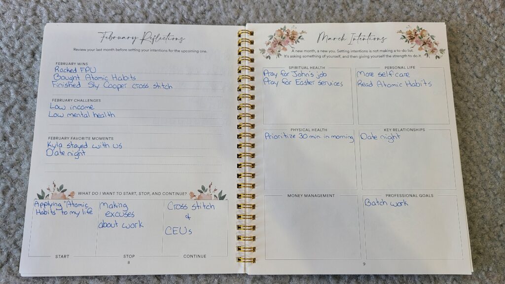 An opened up Silk and Sonder planner, showing the pages "February reflections" and "March intentions"