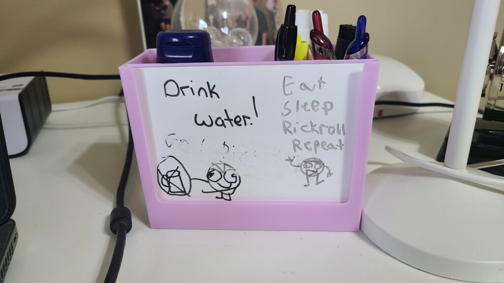 A rectangle-shaped pen holder, holding miscellaneous pens