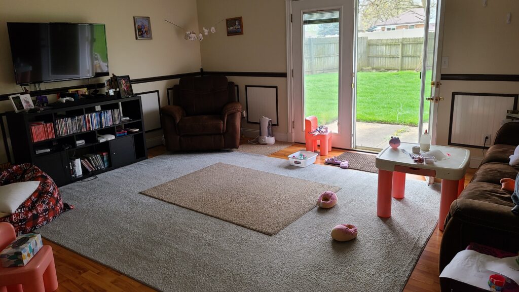 An open-spaced living room with minimal clutter on the floor