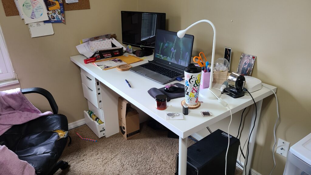 An office desk covered in clutter