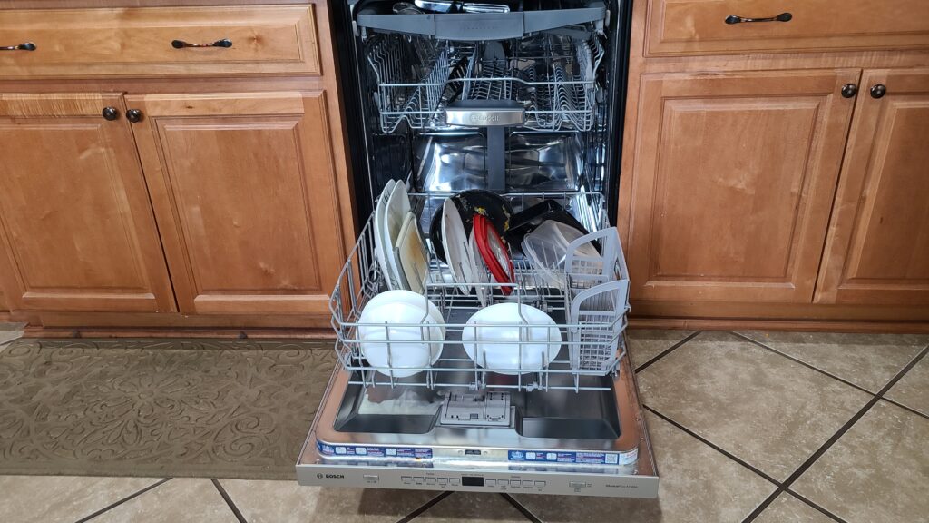 A dishwasher filled with dirty dishes
